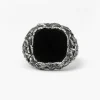 ANELLO CHEVALIER FOGLIE CON PIETRA NERA